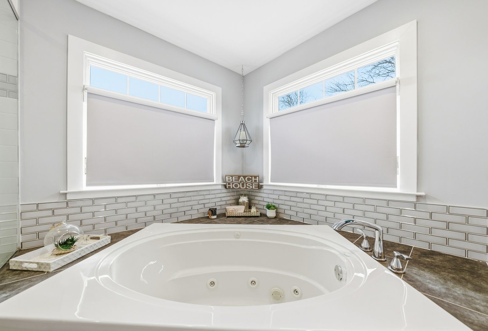 Primary bathroom with jetted tub and glass shower