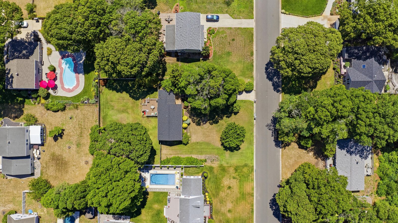 Top-down drone view of the lot, back deck and fenced yard in Cape May Court House NJ