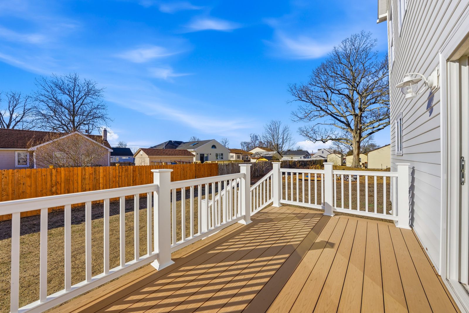 Back deck with white railings