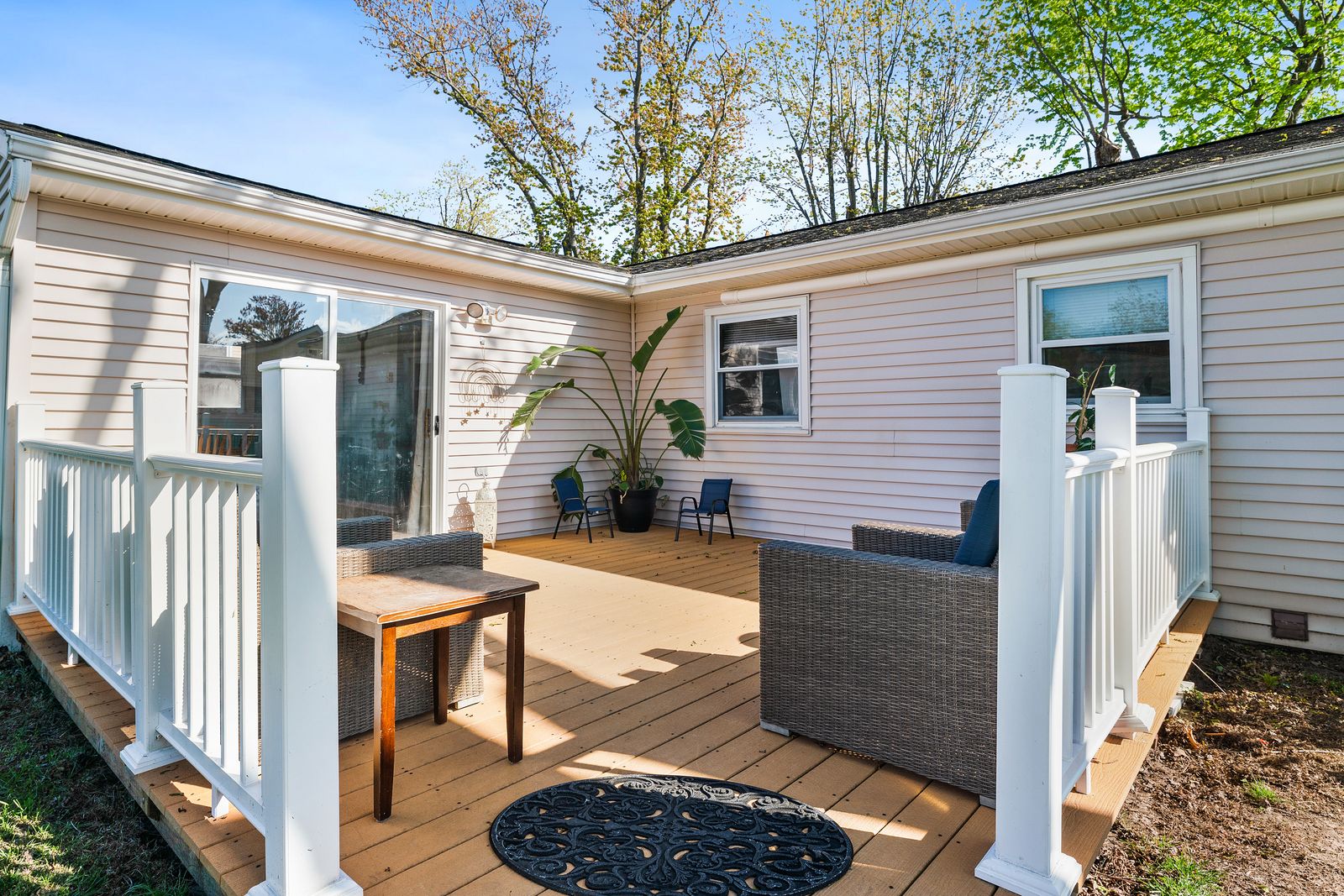 Back deck with outdoor lounge furniture