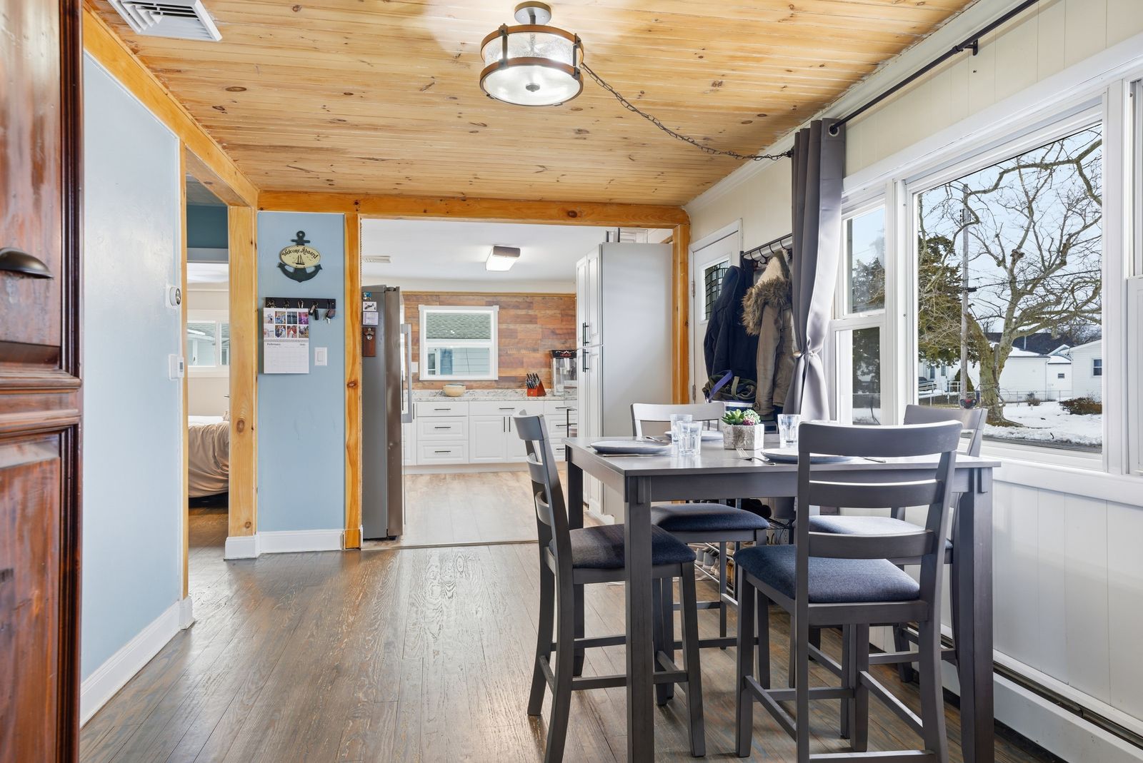 Dining area with knotty pine ceiling