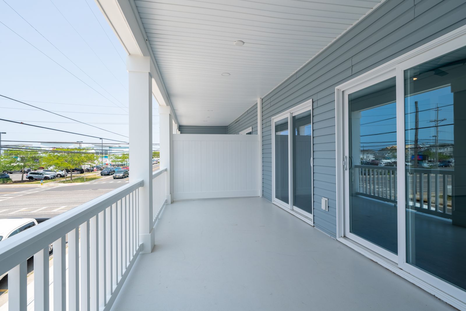 Covered balcony with sliding glass doors