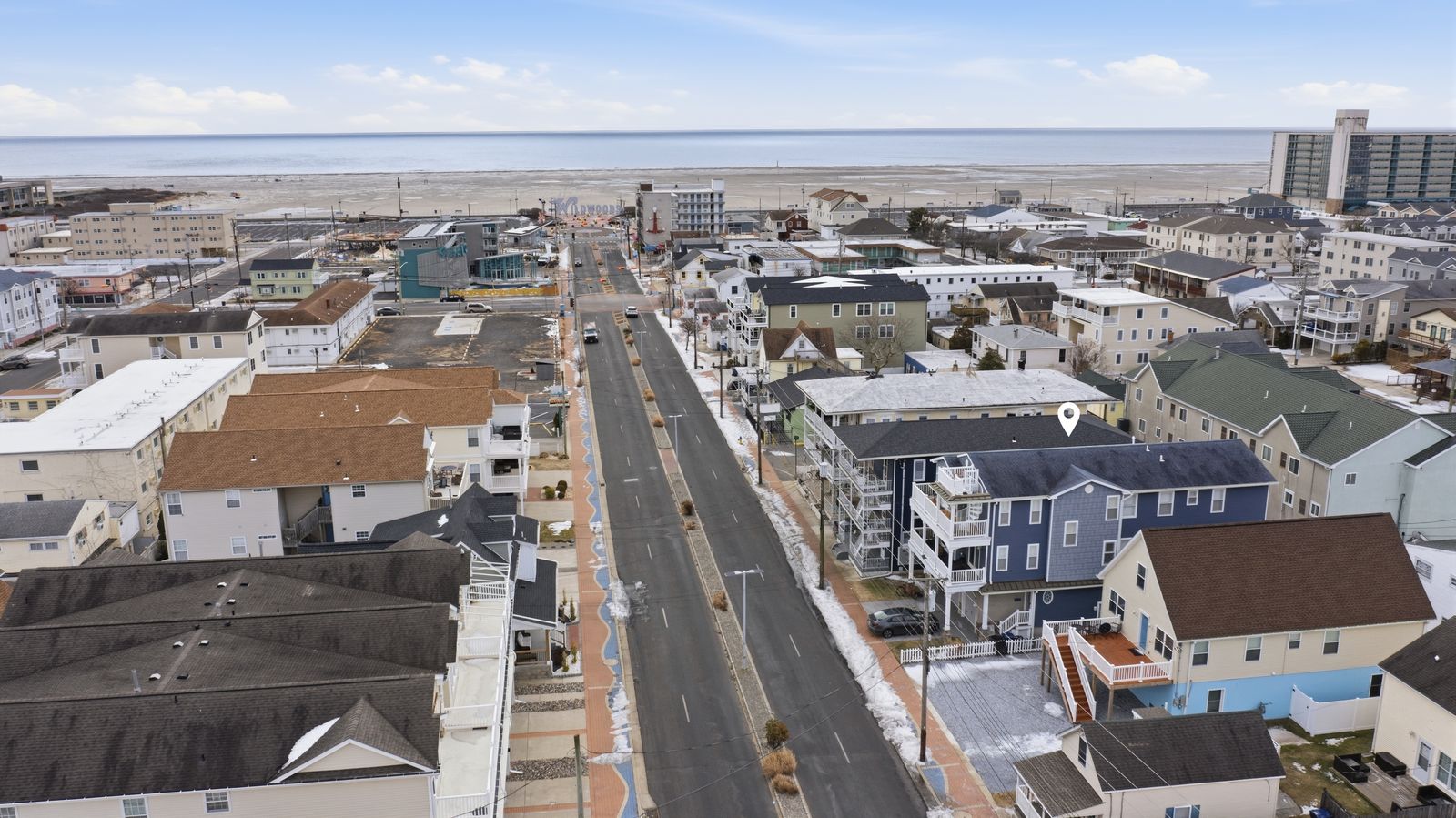 Drone aerial down Rio Grande Ave toward the Wildwood beach and ocean