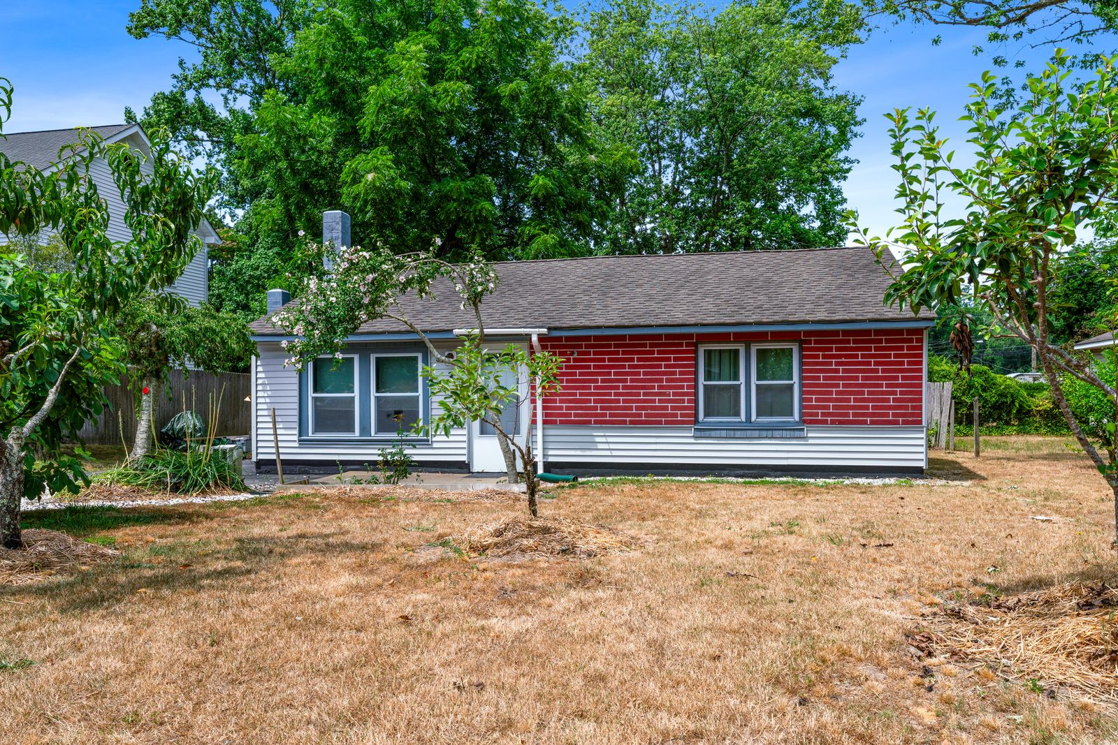 Ranch home with red shingle siding in Cape May NJ