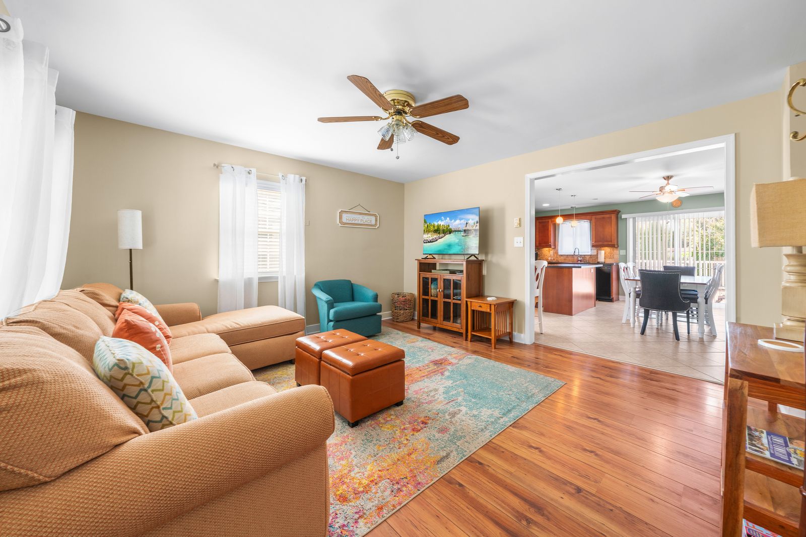Living room with hardwood floors and sectional sofa