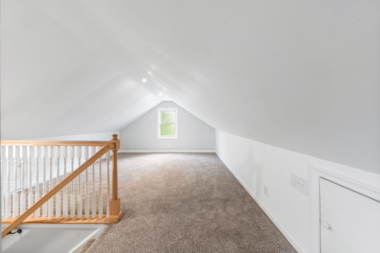 Finished upstairs bonus room with sloped ceilings