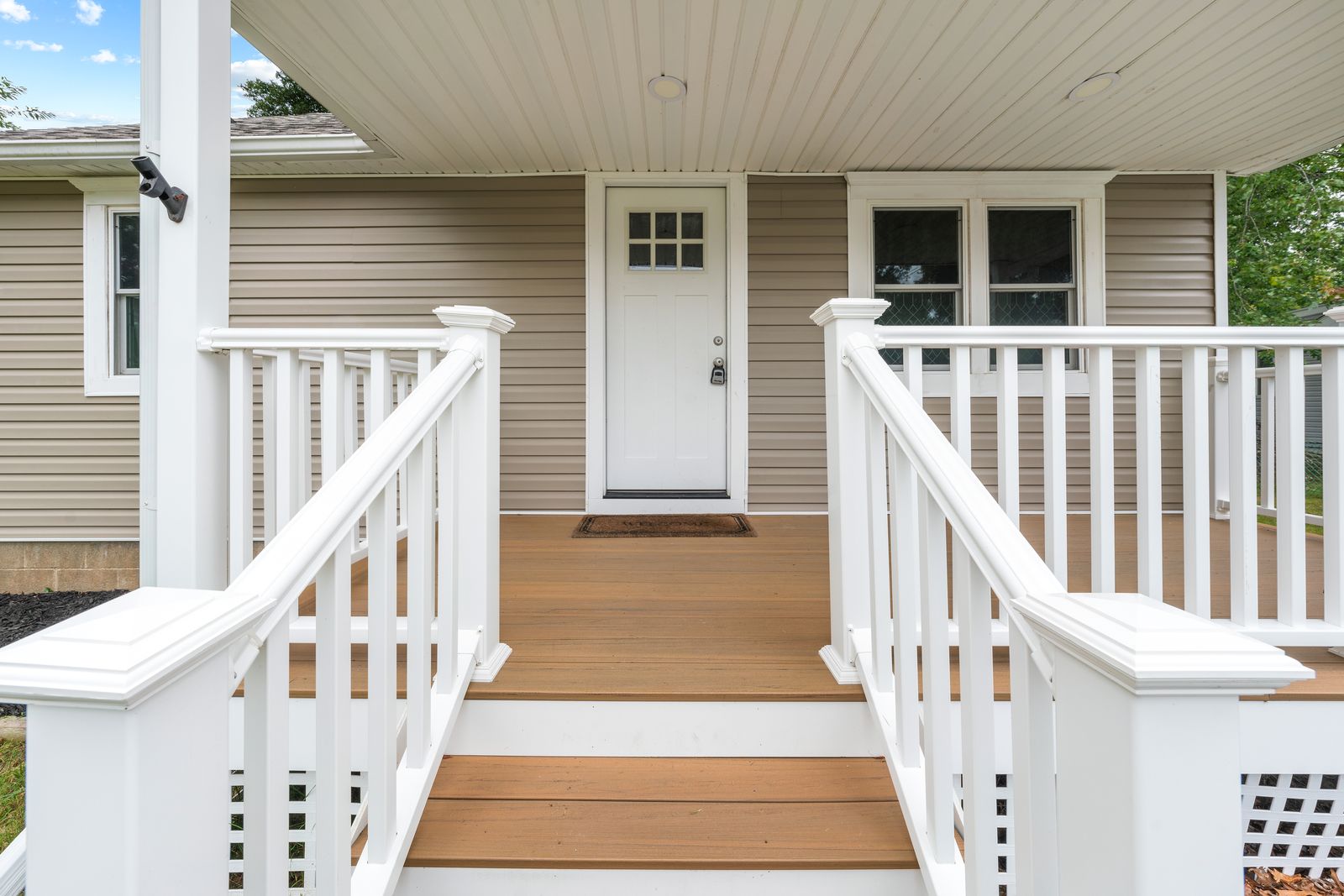 Front porch with white railings
