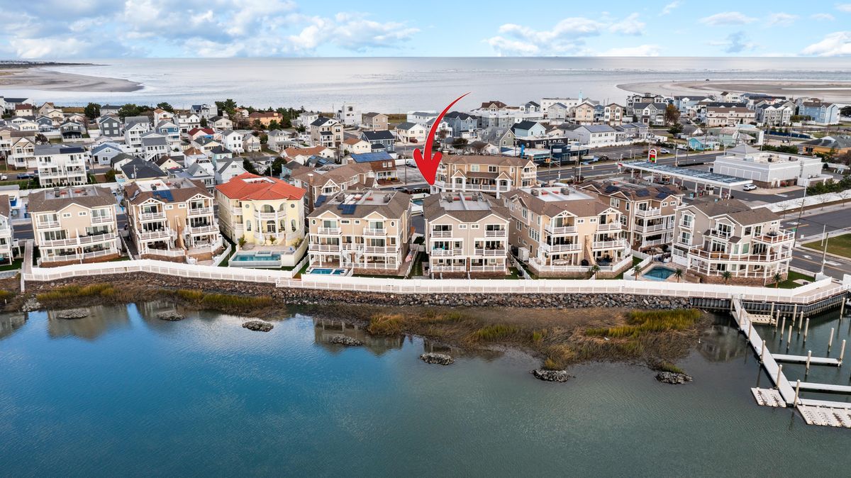 Aerial with an arrow marking the rental on the bay