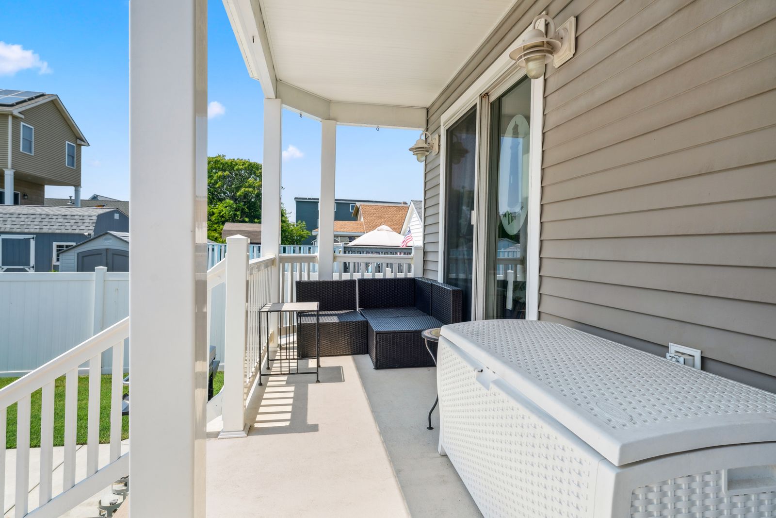 Covered balcony with outdoor seating