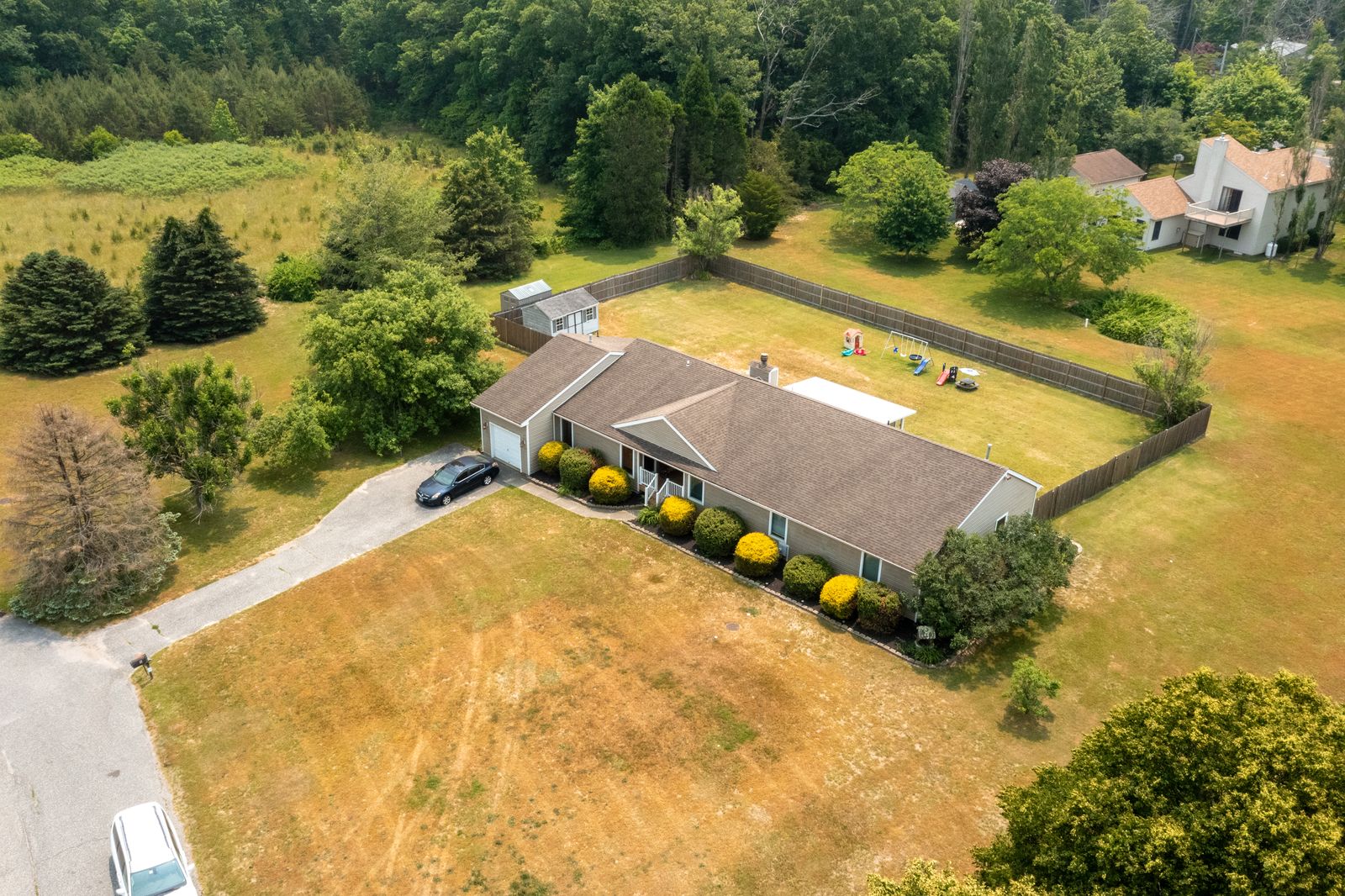 Drone aerial of the ranch home and large lot