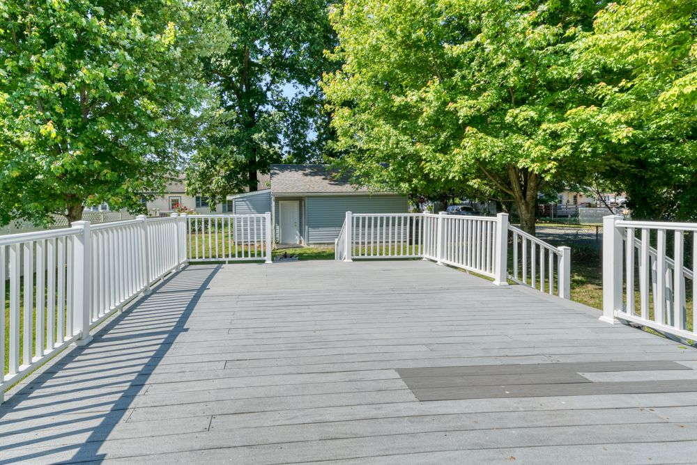 Large back deck with white railings