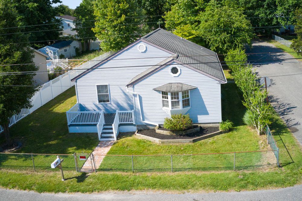 Drone view of the Villas NJ cottage and fenced yard