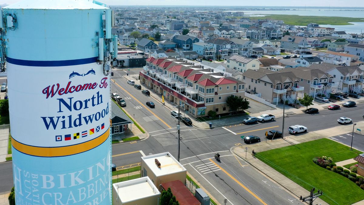 The Welcome to North Wildwood water tower over the town