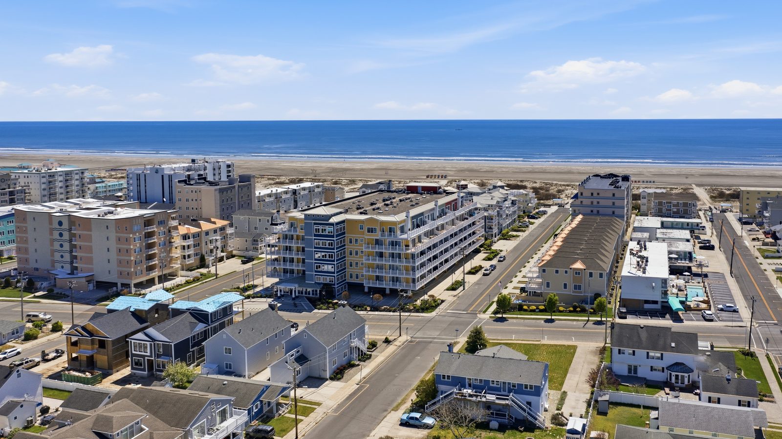 Drone aerial over Wildwood NJ beach and oceanfront buildings