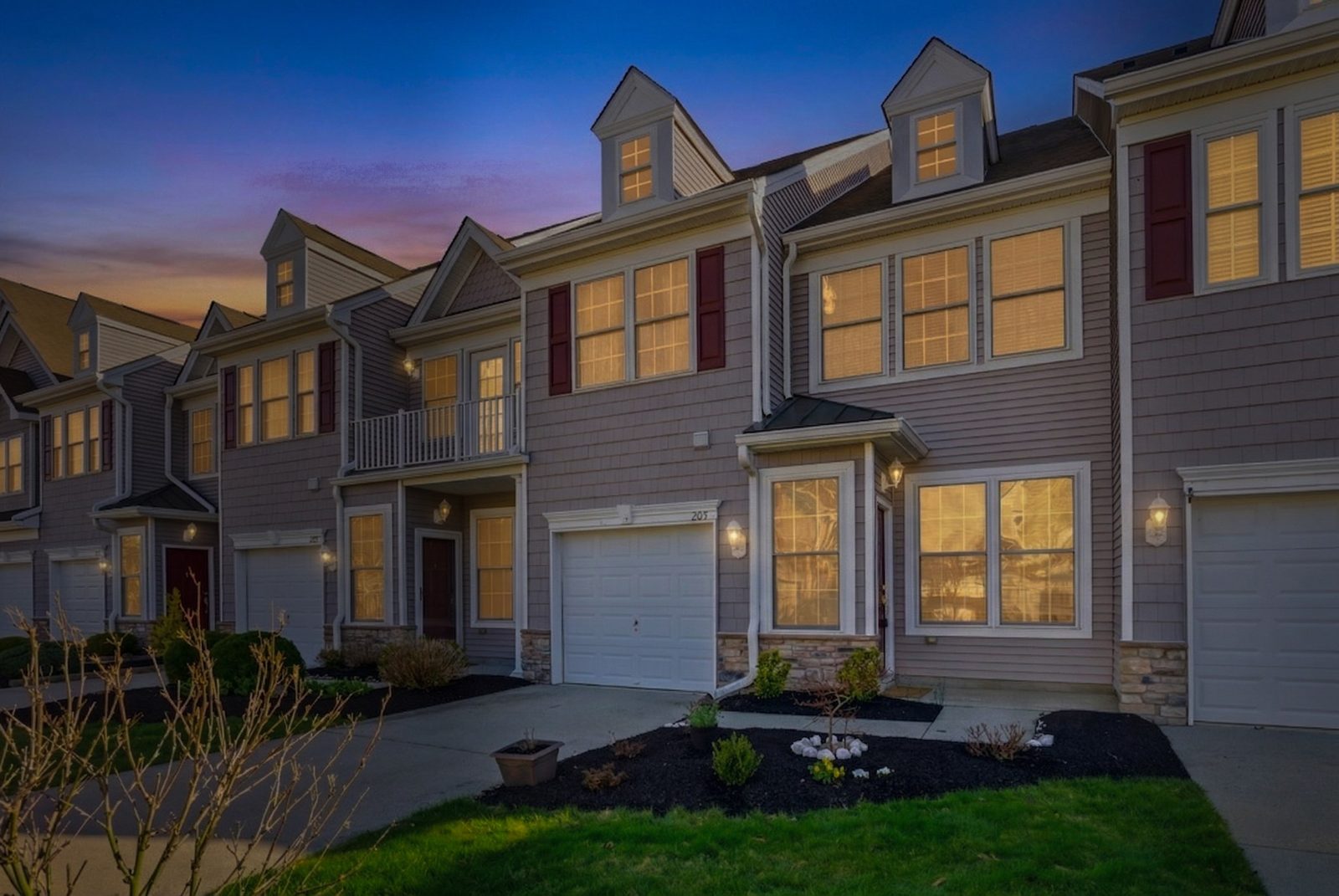 Cape May Court House NJ townhome glowing at twilight